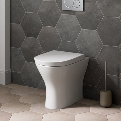 Back wall toilet btw - to,